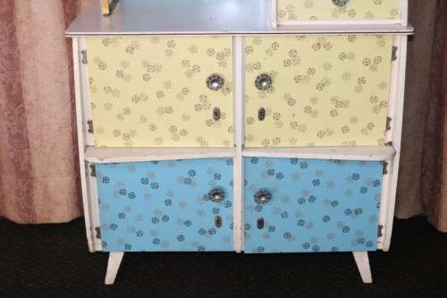 A fantastic Art Deco Hoosier kitchen cabinet w/ loads of cupboard space & a built in clock