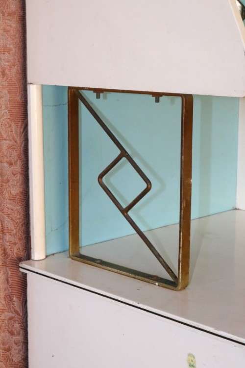 A fantastic Art Deco Hoosier kitchen cabinet w/ loads of cupboard space & a built in clock