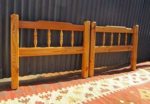 **RS17** Two natural pine spindle "single bed" size headboards in good condition. Bid/headboard
