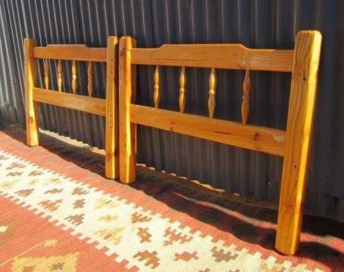 **RS17** Two natural pine spindle "single bed" size headboards in good condition. Bid/headboard