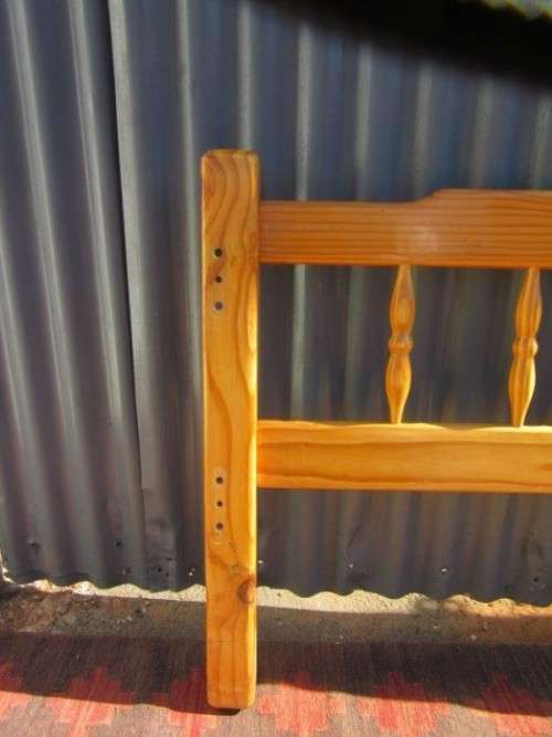 **RS17** Two natural pine spindle "single bed" size headboards in good condition. Bid/headboard