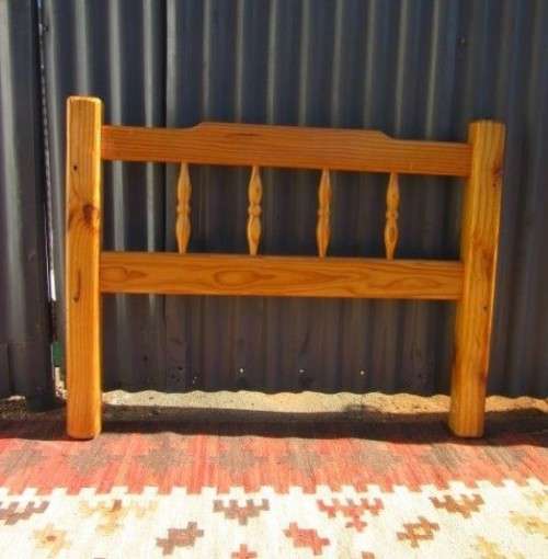 **RS17** Two natural pine spindle "single bed" size headboards in good condition. Bid/headboard