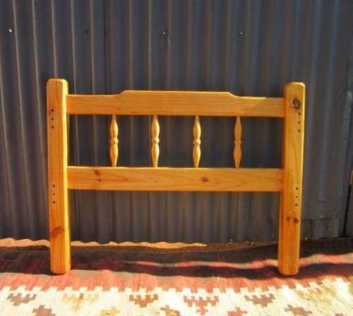 **RS17** Two natural pine spindle "single bed" size headboards in good condition. Bid/headboard