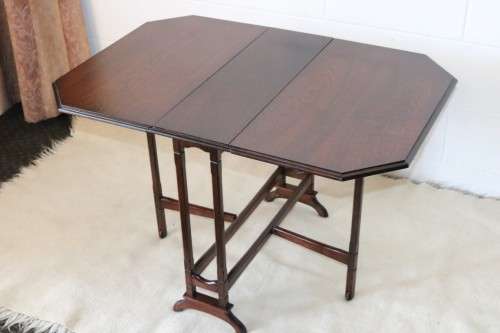 A lovely designed vintage "drop-leaf" occasional/ console/ card table in great condition