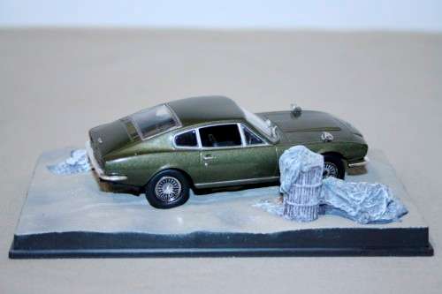 A James Bond 007 Aston Martin DBS die cast model car from the movie "On her Majesty's secret service
