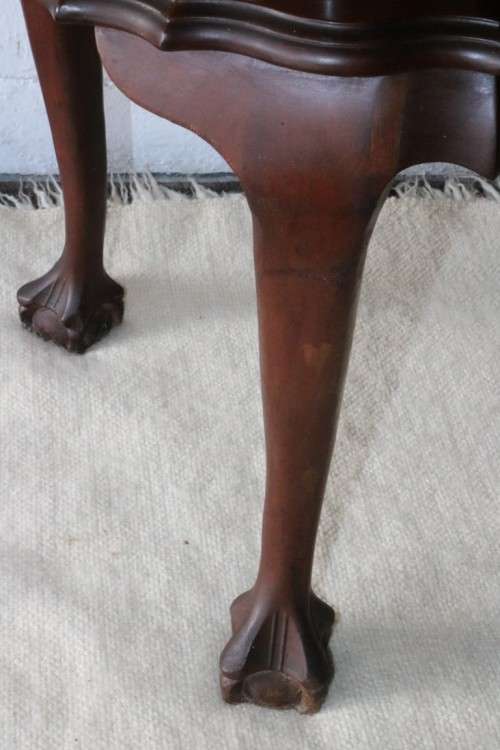 A beautiful vintage "curved glass" ball and claw display cabinet w scalloped edges & glass shelves