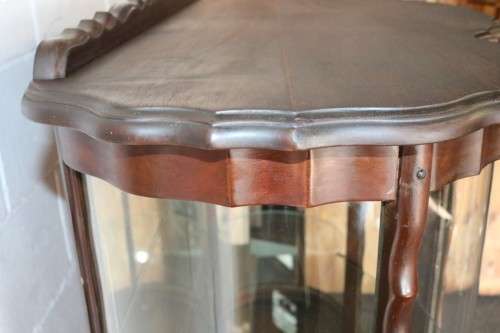 A beautiful vintage "curved glass" ball and claw display cabinet w scalloped edges & glass shelves