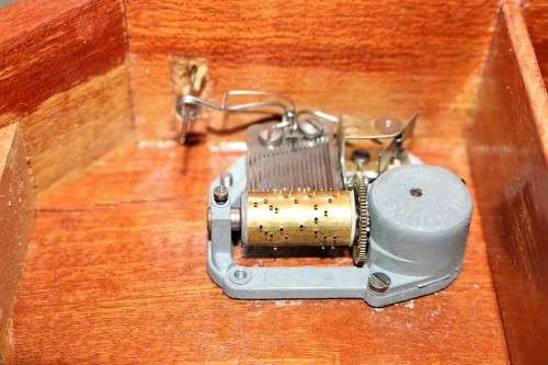 A wonderful Italian-made sewing box/ table with French lacquer detailing and a music box - stunning!