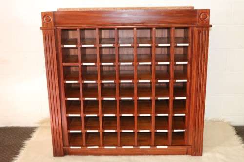 An awesome 49 bottle (floor cabinet) wine rack with individual wine bottle slots and sections