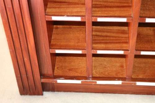 An awesome 49 bottle (floor cabinet) wine rack with individual wine bottle slots and sections