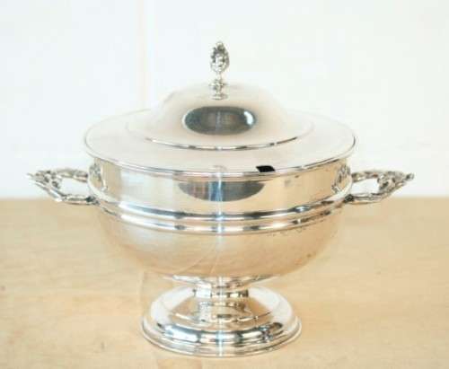 An exquisite vintage "EMESS" silver plated tureen with a slotted lid and beautiful ornate handles