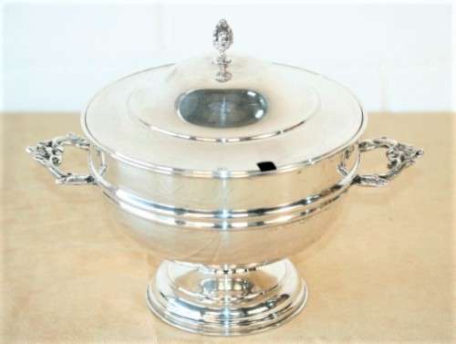 An exquisite vintage "EMESS" silver plated tureen with a slotted lid and beautiful ornate handles