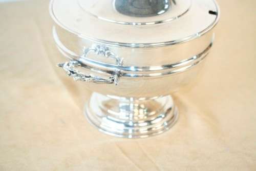 An exquisite vintage "EMESS" silver plated tureen with a slotted lid and beautiful ornate handles