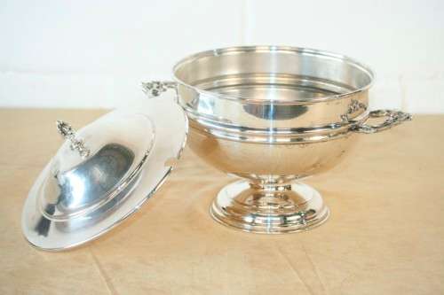 An exquisite vintage "EMESS" silver plated tureen with a slotted lid and beautiful ornate handles