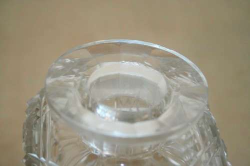 A beautiful classic ornate lead cut-crystal whiskey/ brandy decanter with a cut-crystal stopper