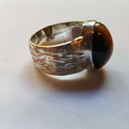 An exquisite vintage "Birks of Canada" sterling silver ladies ring w/ a large oval Tiger's Eye stone