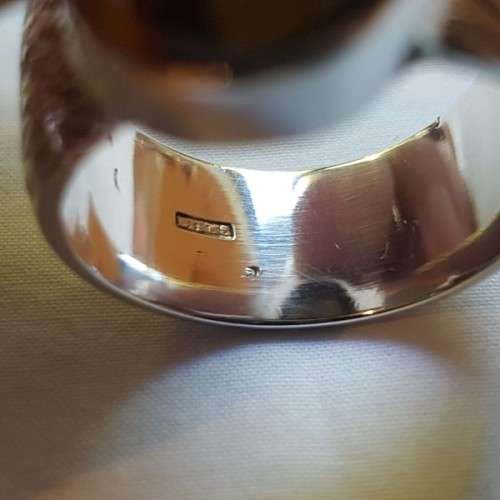 An exquisite vintage "Birks of Canada" sterling silver ladies ring w/ a large oval Tiger's Eye stone