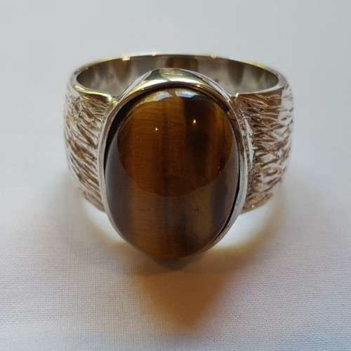 An exquisite vintage "Birks of Canada" sterling silver ladies ring w/ a large oval Tiger's Eye stone