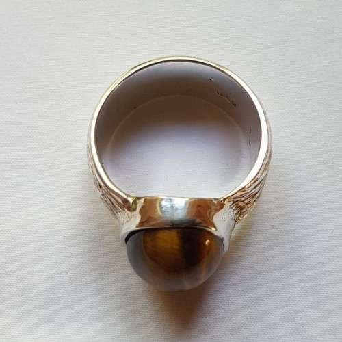 An exquisite vintage "Birks of Canada" sterling silver ladies ring w/ a large oval Tiger's Eye stone