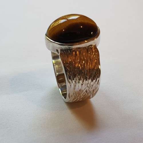 An exquisite vintage "Birks of Canada" sterling silver ladies ring w/ a large oval Tiger's Eye stone