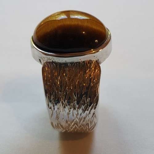 An exquisite vintage "Birks of Canada" sterling silver ladies ring w/ a large oval Tiger's Eye stone