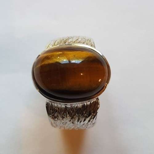 An exquisite vintage "Birks of Canada" sterling silver ladies ring w/ a large oval Tiger's Eye stone