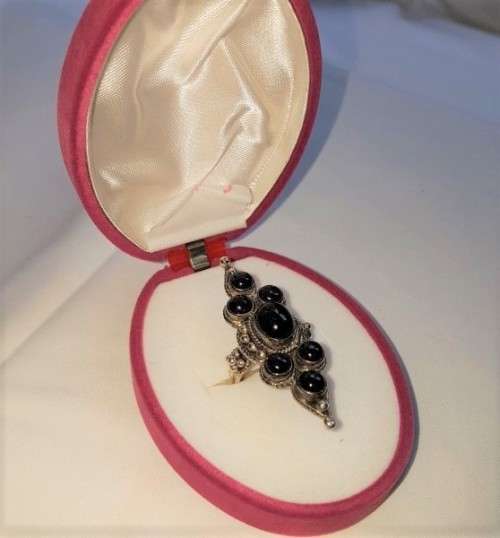 A truly spectacular Art Nouveau styled ladies ring with an array of beautiful round Amethyst stones