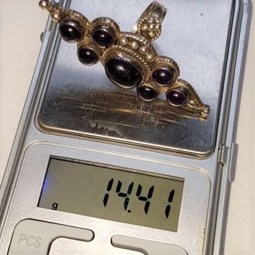 A truly spectacular Art Nouveau styled ladies ring with an array of beautiful round Amethyst stones