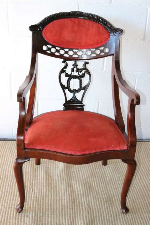 A stunning antique Edwardian occasional armchair with magnificent carved detailing - amazing!