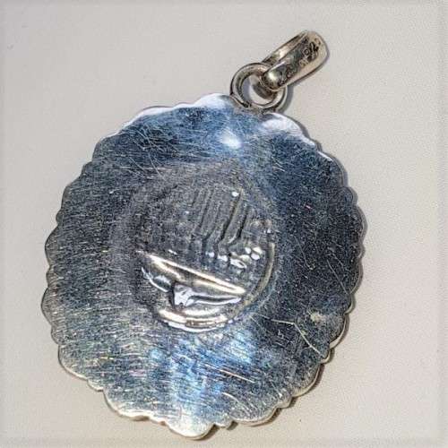 A wonderful vintage ladies sterling silver pendant with a large clear Topaz & 8 Amethyst stones