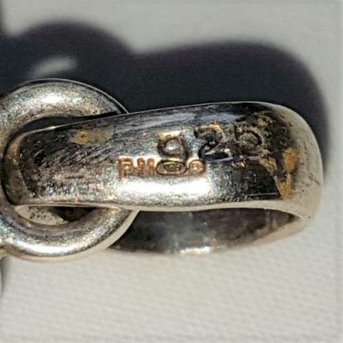 A wonderful vintage ladies sterling silver pendant with a large clear Topaz & 8 Amethyst stones