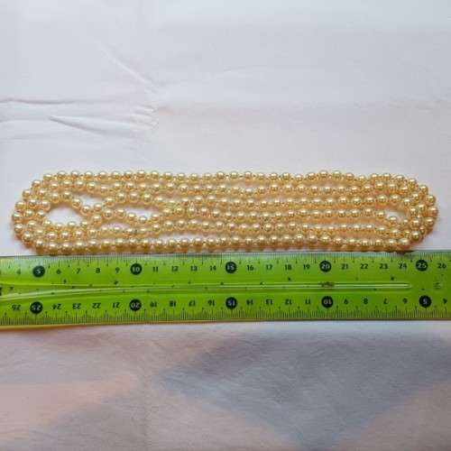 A beautiful 136cm endless-strand of ivory-white Japanese Akoya cultured pearls in stunning condition