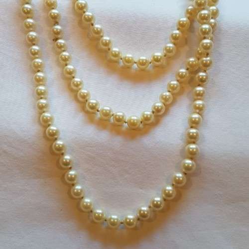 A beautiful 136cm endless-strand of ivory-white Japanese Akoya cultured pearls in stunning condition