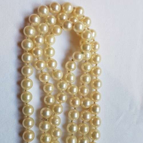 A beautiful 136cm endless-strand of ivory-white Japanese Akoya cultured pearls in stunning condition