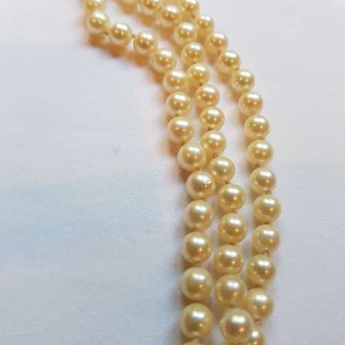 A beautiful 136cm endless-strand of ivory-white Japanese Akoya cultured pearls in stunning condition