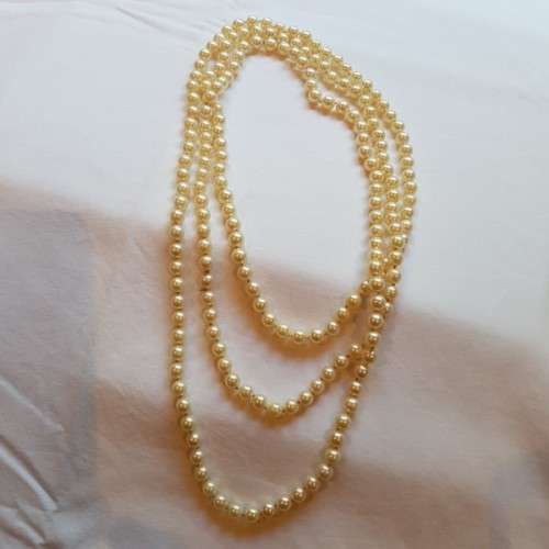 A beautiful 136cm endless-strand of ivory-white Japanese Akoya cultured pearls in stunning condition