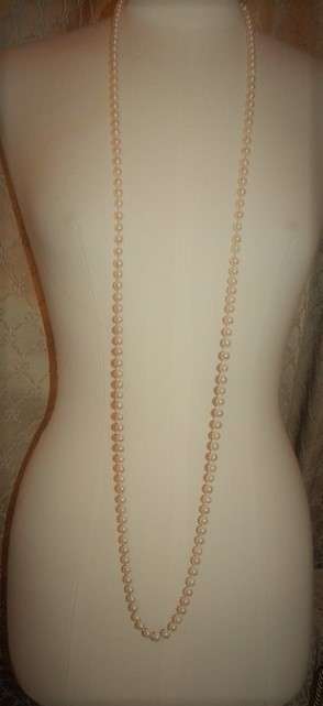 A beautiful 136cm endless-strand of ivory-white Japanese Akoya cultured pearls in stunning condition