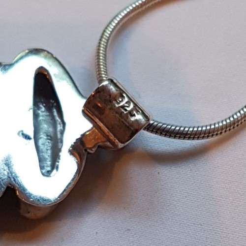 A beautiful sterling silver pendant w/ a large square Amethyst stone & baroque pearl on a chain