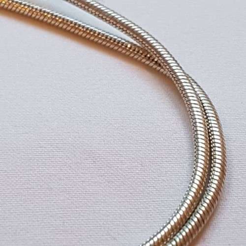 A beautiful sterling silver pendant w/ a large square Amethyst stone & baroque pearl on a chain