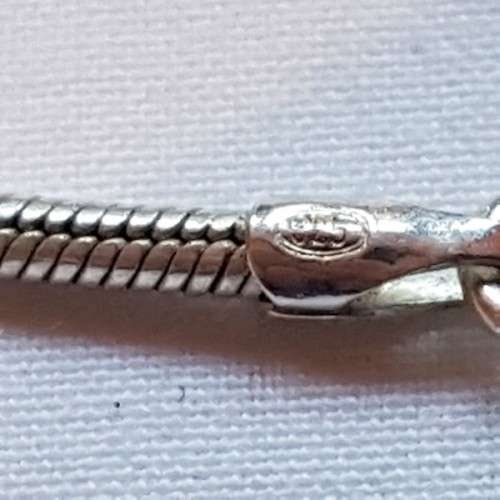 A beautiful sterling silver pendant w/ a large square Amethyst stone & baroque pearl on a chain