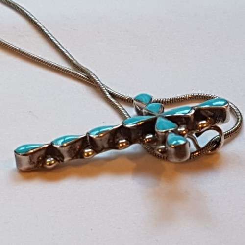 An exquisitely made North American Indian "Turquoise stone" (set in sterling silver) cross pendant