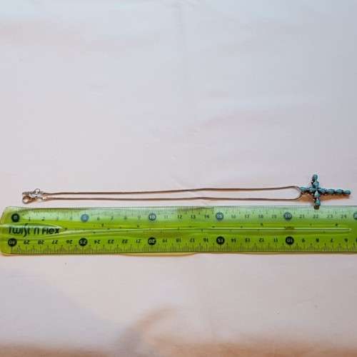 An exquisitely made North American Indian "Turquoise stone" (set in sterling silver) cross pendant