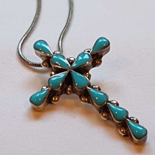 An exquisitely made North American Indian "Turquoise stone" (set in sterling silver) cross pendant