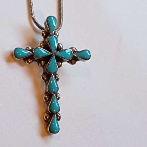 An exquisitely made North American Indian "Turquoise stone" (set in sterling silver) cross pendant