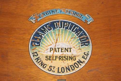 **RS17** An awesome (c1930) "Ellams Duplicators" mimeograph in a cabinet with the original roller