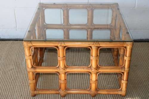 A lovely cane occasional/ coffee table with a removable glass top - stunning in a holiday home
