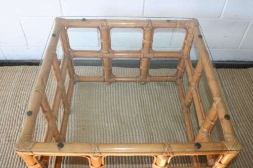 A lovely cane occasional/ coffee table with a removable glass top - stunning in a holiday home