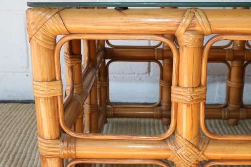 A lovely cane occasional/ coffee table with a removable glass top - stunning in a holiday home