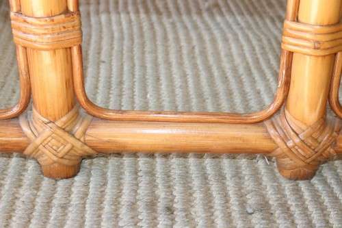 A lovely cane occasional/ coffee table with a removable glass top - stunning in a holiday home