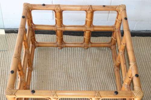 A lovely cane occasional/ coffee table with a removable glass top - stunning in a holiday home